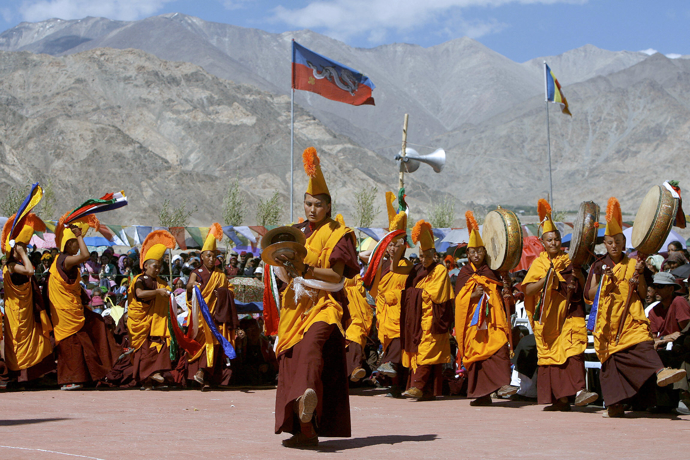 Shey, INDIA: Buddhist nuns perform a rarely performed religious dance called Nga Chham, outside The Naro Photang Puspahari temple in Shey, Some 15 kilometers south of Leh, 19 July 2007. (MANPREET ROMANA/AFP via Getty Images)