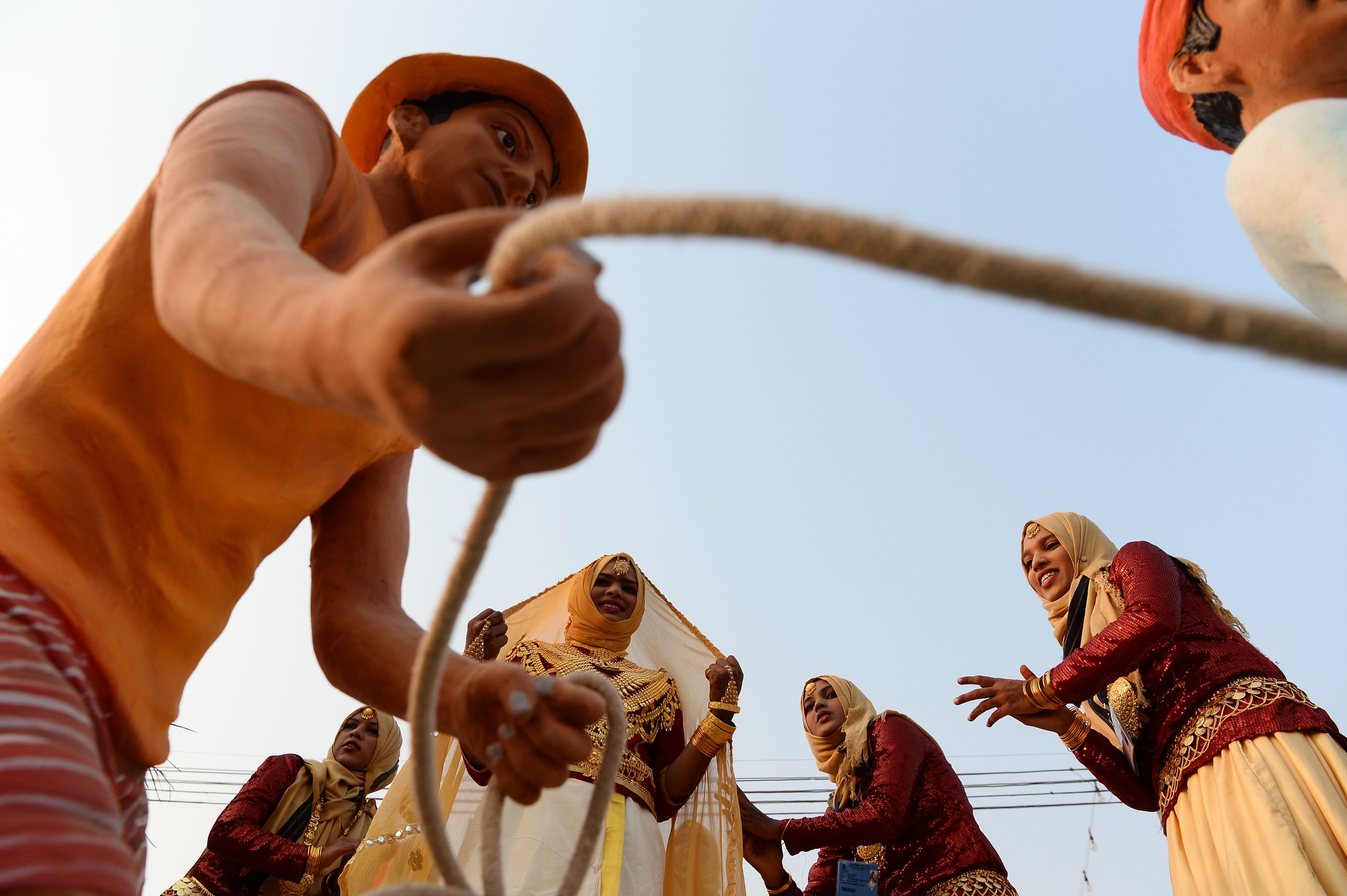 Artists from Lakshadweep perform during a press preview of floats participating in the forthcoming Republic Day parade in New Delhi on January 22, 2018. (SAJJAD HUSSAIN/AFP via Getty Images)