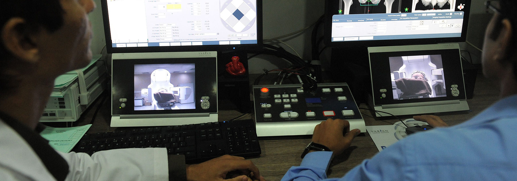 Radiation technicians monitor as a cancer patient lies on India’s first True Beam Radiotherapy Technology Linear Accelerator at the Health Care Global (HCG) hospital in Ahmedabad. (SAM PANTHAKY/AFP/Getty Images)