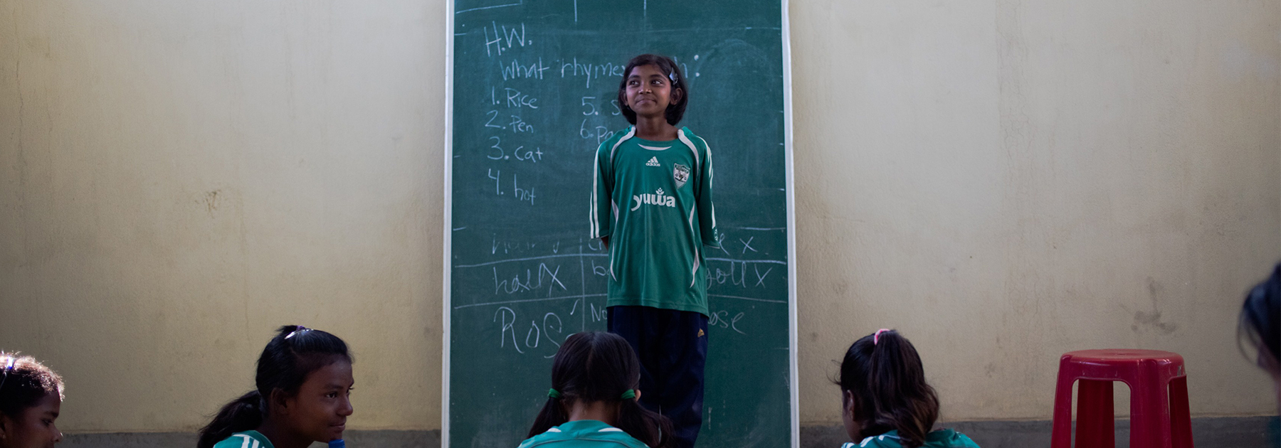 A student, age 11, and member of ‘The Rockstars’ Yuwa School football training team introduces herself in an English class at the school in Hutup Village. (Rebecca Conway/AFP/Getty Images)